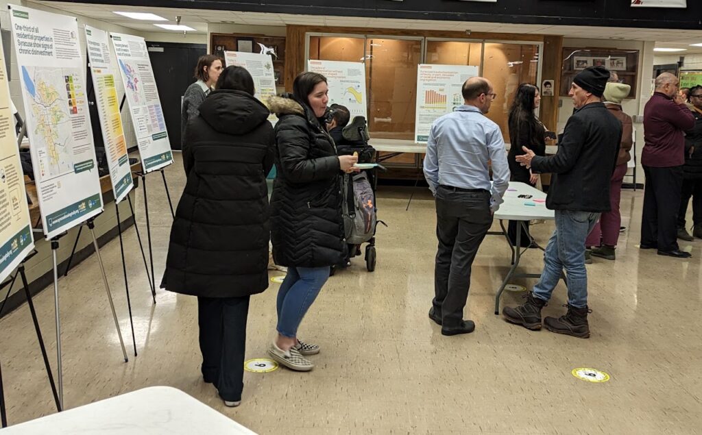 CZB AND COMMUNITY MEMBERS AT THEE SYRACUSE NY HOUSING STRATEGY COMMUNITY MEETING